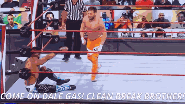 a wrestling match with the words come on dale gas clean break brother on the bottom