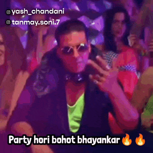 a man wearing sunglasses and headphones says party hori bohot