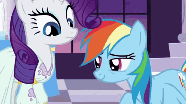 rainbow dash and rarity are standing next to each other