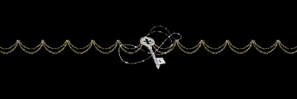 a key is hanging from a string of gold beads