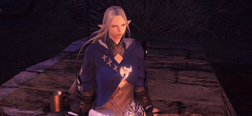 a woman with long blonde hair is wearing a blue hoodie with the letters xxx on the front