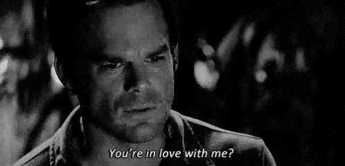 a black and white photo of a man asking if he 's in love with me .