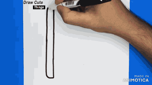 a hand is holding a marker with the words draw cute things written above it
