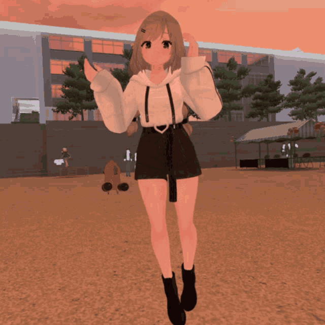 a girl in a hoodie and shorts stands in front of a large building