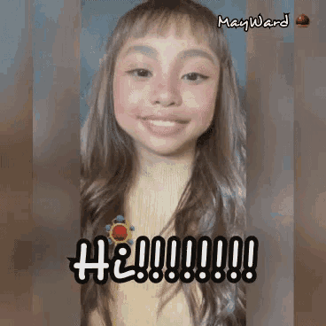 a girl with long brown hair is smiling and says hey !!!