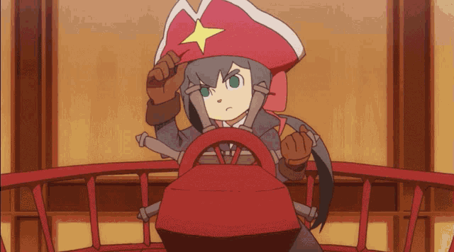 a cartoon character with a red hat and a yellow star on it