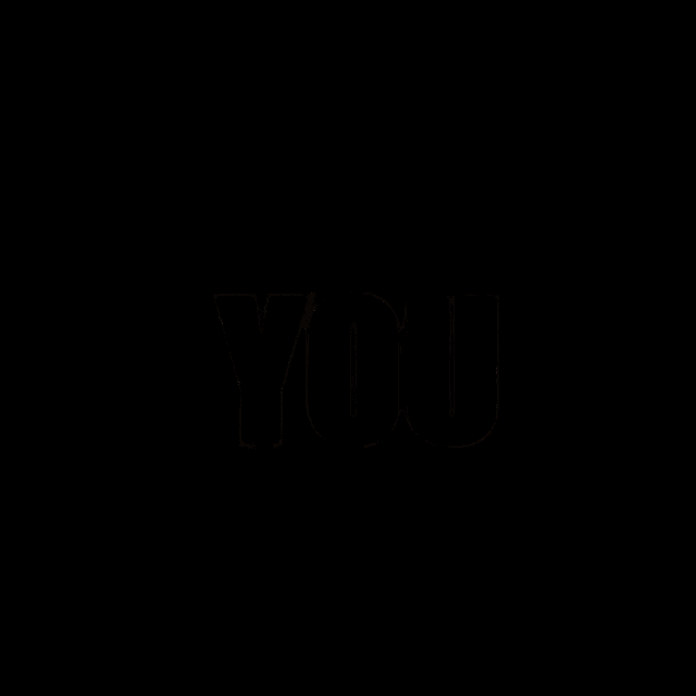 a man in a suit is pointing at the camera with the word you written in the background