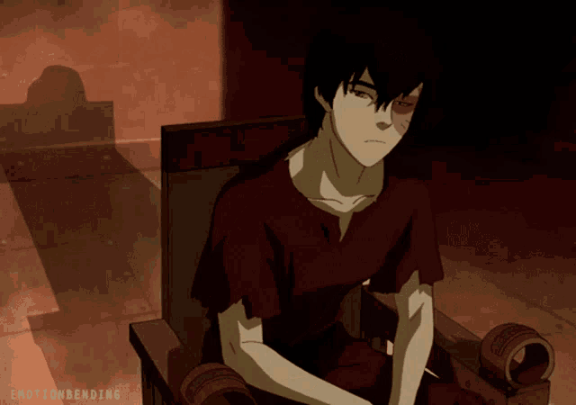 a man in a red shirt is sitting in a chair with the words emotion bending behind him