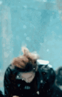 a person is swimming in a pool with a scuba gear on