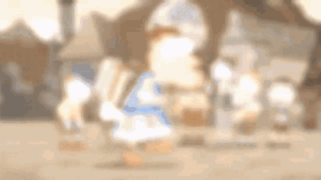 a blurry picture of a group of cartoon characters standing in front of a building .