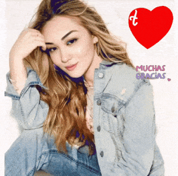 a woman wearing a denim jacket with muchas gracias written on it