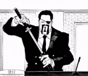 a man in a suit and tie is holding a sword in his hand .