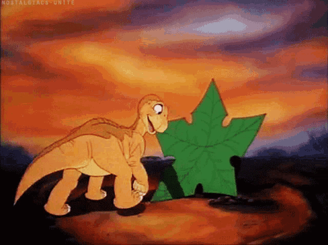 a cartoon of a dinosaur standing next to a leaf