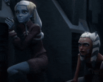 two cartoon characters with blue faces are sitting next to each other in a dark room