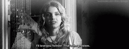 a woman is standing in front of a window and saying `` i 'll love you forever that 's the problem . ''