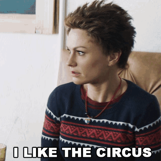 a woman sitting in a chair with the words i like the circus written below her