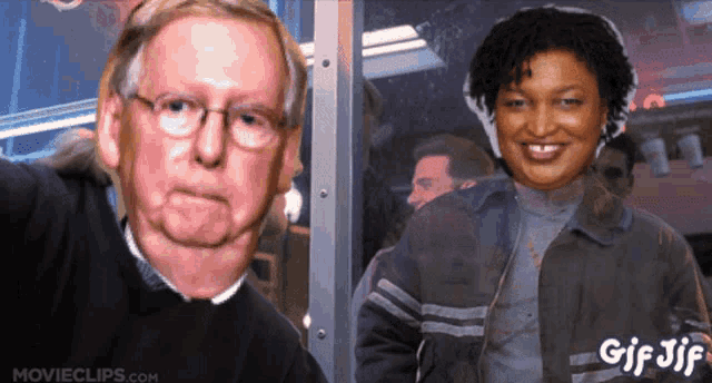 a gif of a man and a woman with movieclips.com in the bottom right corner