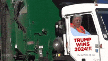 a garbage truck that says trump wins 2024 on it