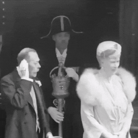 a black and white photo of a man and woman
