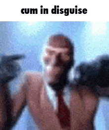a man in a suit and tie is pointing at the camera with the words cum in disguise .