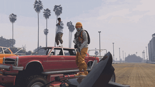 a man with a gun stands on top of a red car in a video game