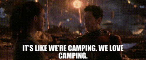 a man and a woman are standing next to each other with the words it 's like we 're camping we love camping ..