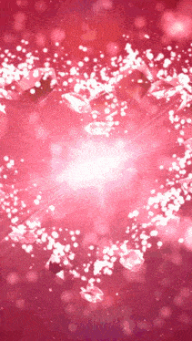 a pink background with a lot of diamonds and sparkles