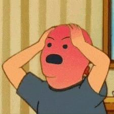 a cartoon character with a red face is holding his head in pain .