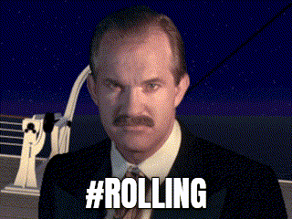 a man with a mustache is standing in front of a ship and the caption #rolling