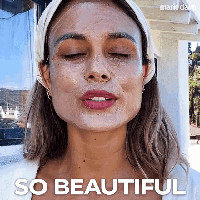 a woman with a mask on her face and the words so beautiful behind her
