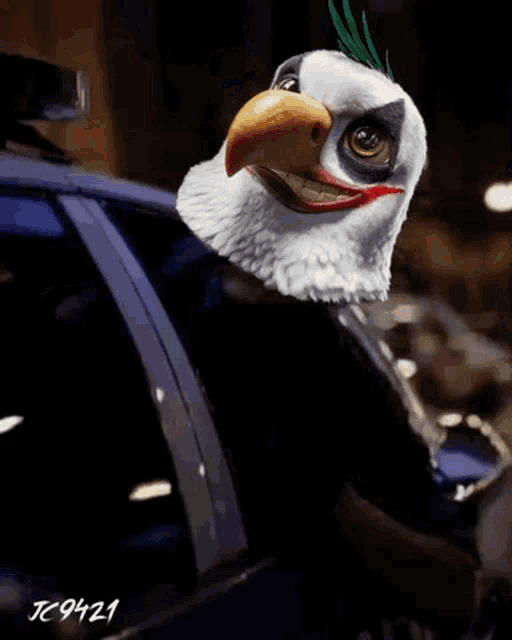 a bald eagle with a joker mask is sitting in the back of a police car ..