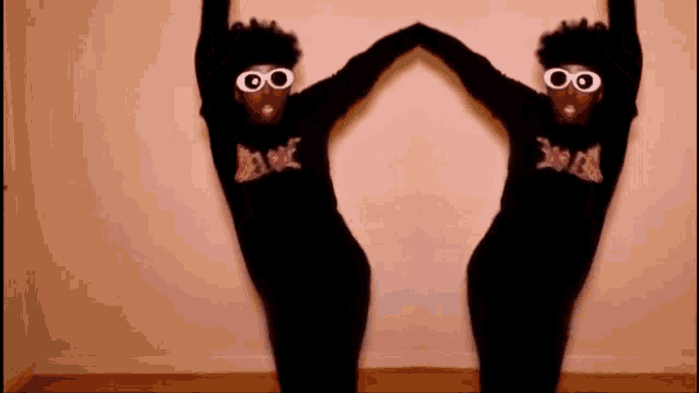 two people wearing black sweaters with the word dave on it