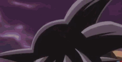 a close up of a cartoon character with a mask on his face and red eyes .