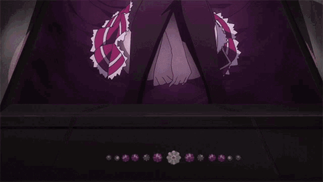 a girl in a purple cape is sitting down