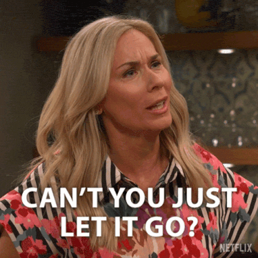 a woman says " can 't you just let it go " while wearing a striped shirt