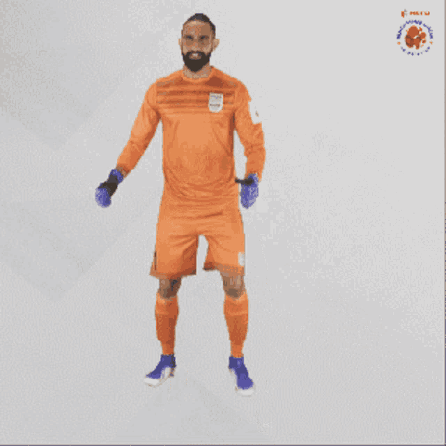 a soccer player with the number 1 on his jersey is dancing