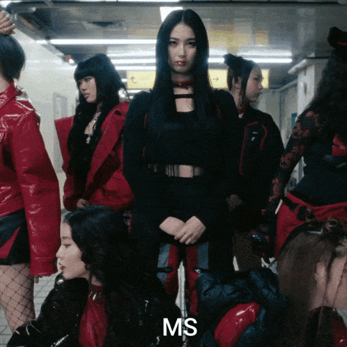 a group of women standing next to each other with the word ms on the bottom left