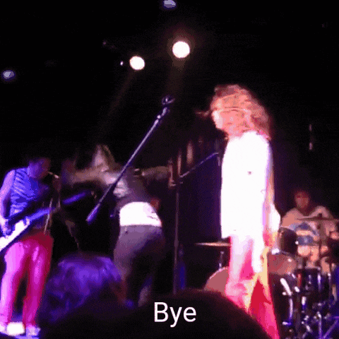 a group of people on a stage with the word bye in the lower right corner