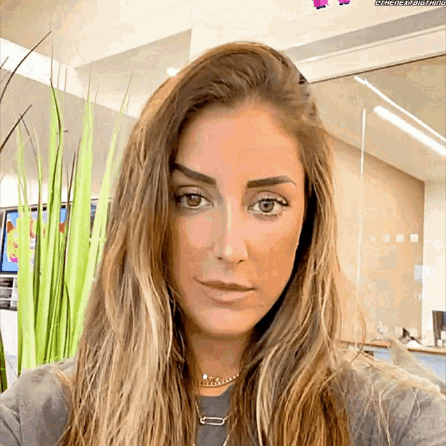 a close up of a woman 's face with a watermark that says meme-the-brainstorm