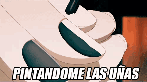 a close up of a person 's nails with the words pintandome las uñas below it