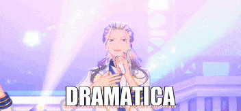 a man is singing into a microphone and the word dramatica is above him .