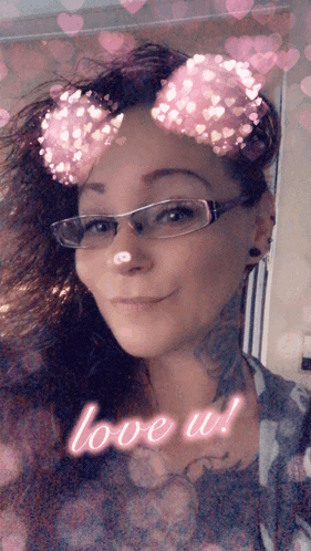 a woman wearing glasses with hearts on her face and the words love u