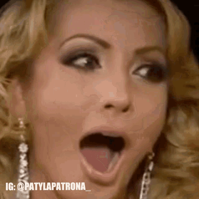a close up of a woman 's face with the hashtag patylapatrona