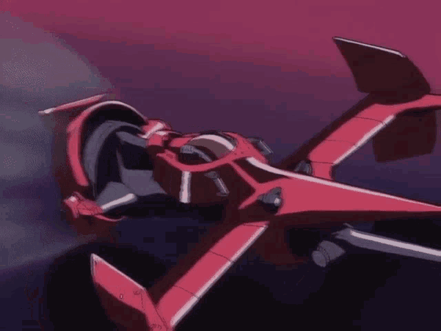 a red jet is flying in a dark sky