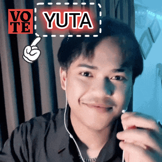 a man wearing ear buds and a vote yuta sticker