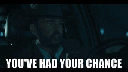 a man in a cowboy hat is driving a car and says you 've had your chance