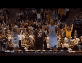 a basketball player with the number 35 on his back jumps in the air