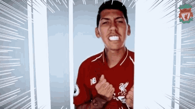 a man in a red new balance shirt is making a funny face