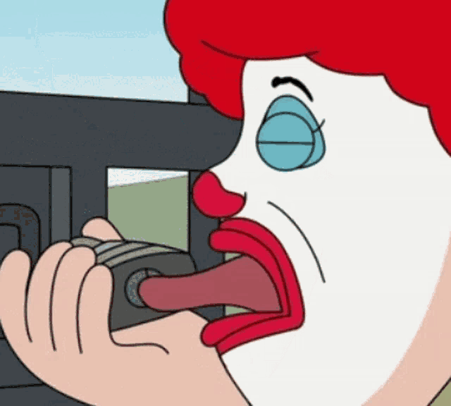 a cartoon of mcdonald 's clown taking a picture