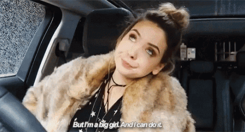 a woman in a fur coat is driving a car and says but i 'm a big girl